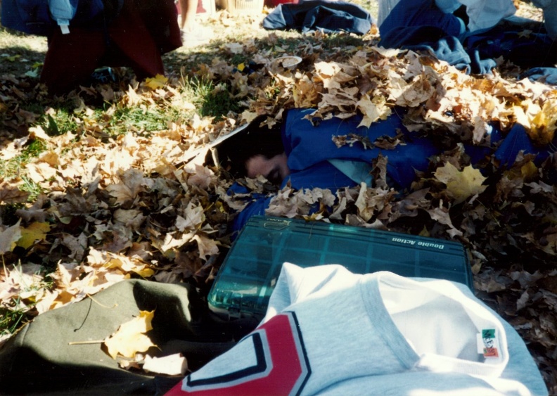 Eric Matyac asleep under the leaves.jpg